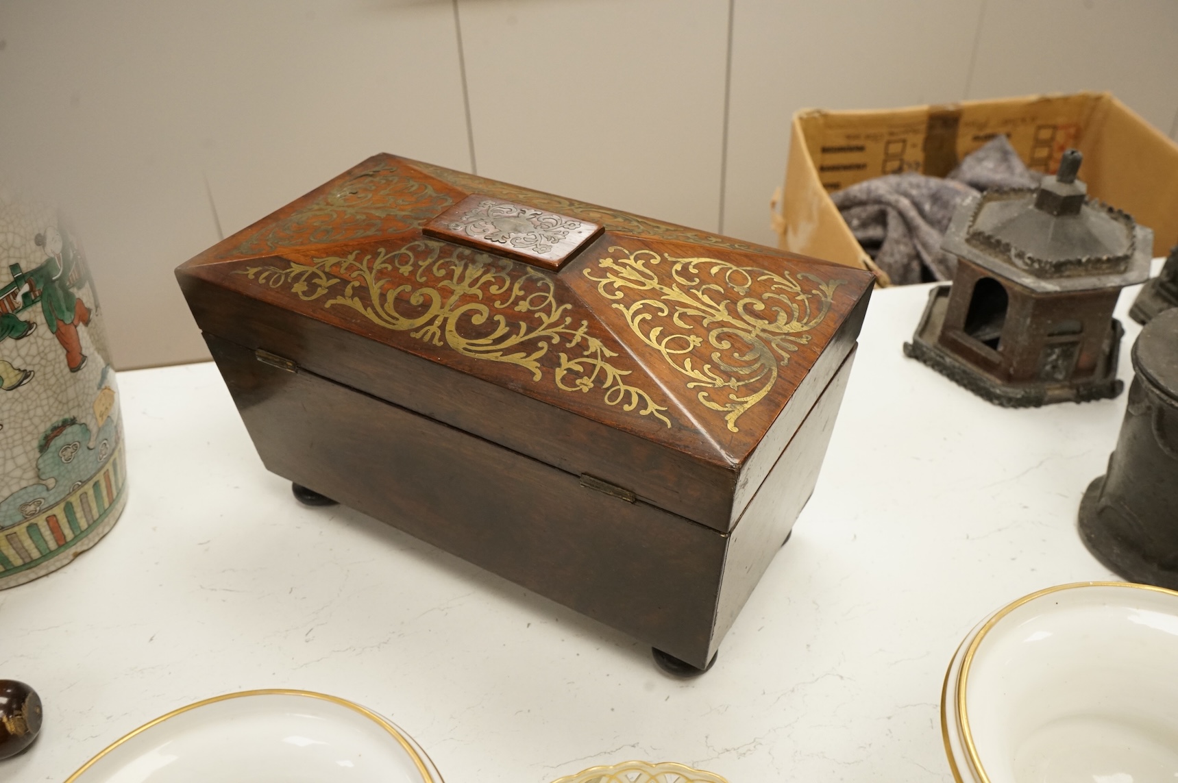 A William IV rosewood and cut brass inlaid tea caddy, 32cm wide